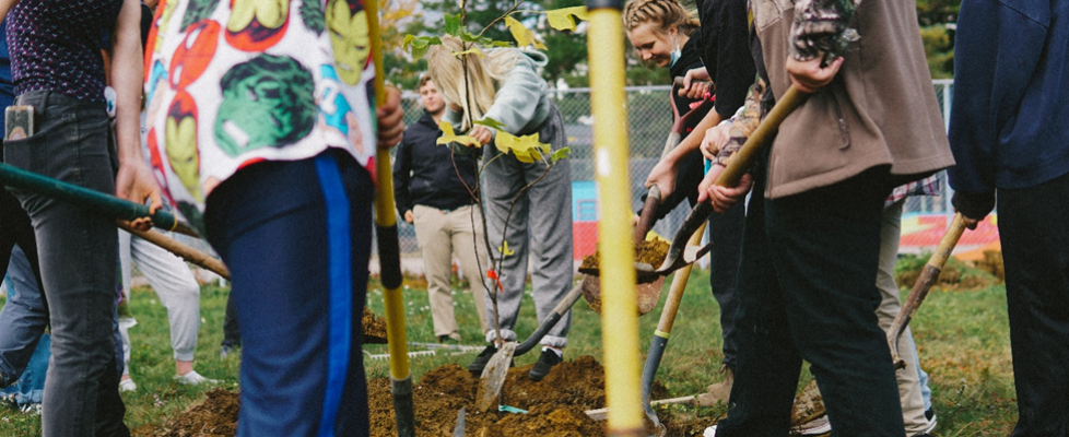 Photo: Planting hardwood trees with the North Queens Community School (NQCS) at Harmony Park in Caledonia - October, 2021.